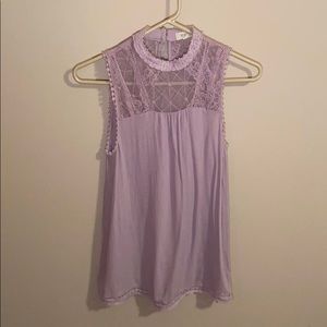 Lilac colored top with mock neck lace detail